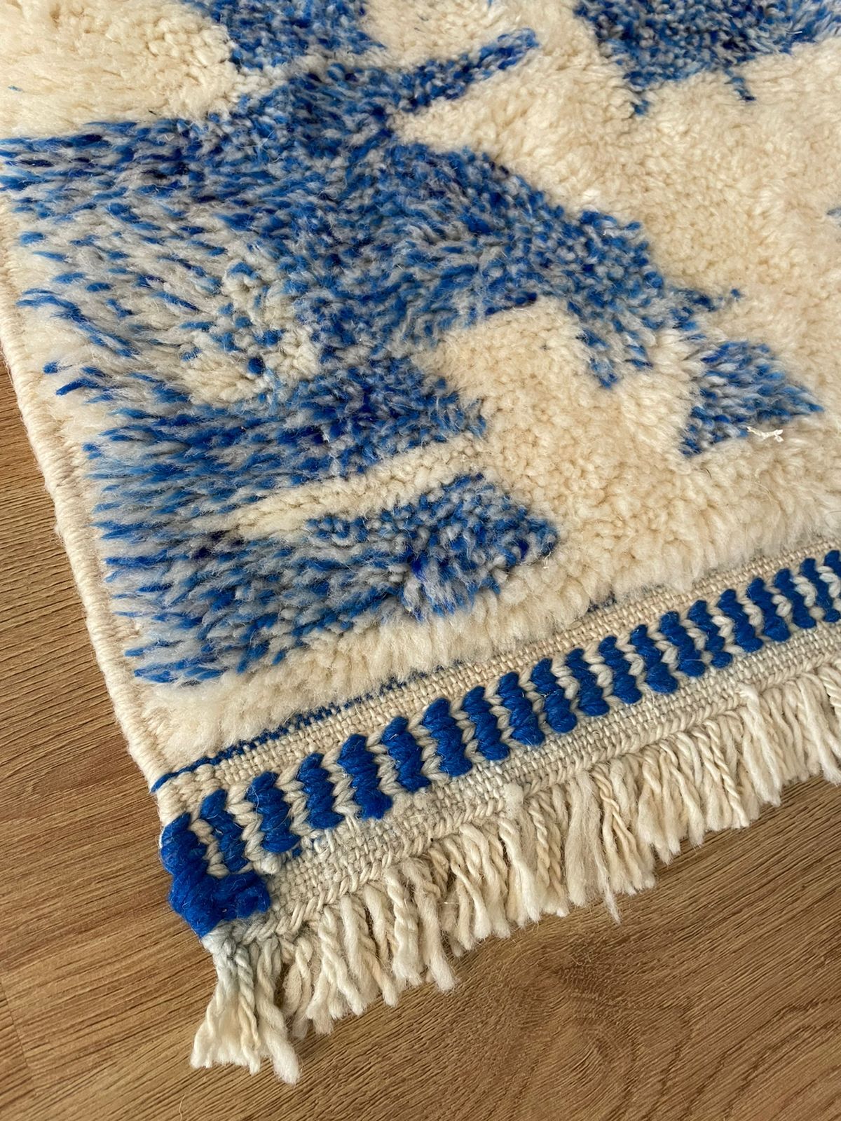 Berber carpet with blue patterns