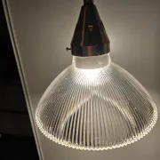 Vintage globe-style holophane on a chrome stem.