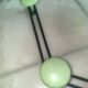 Coat rack with 4 green metal hooks from the 70s