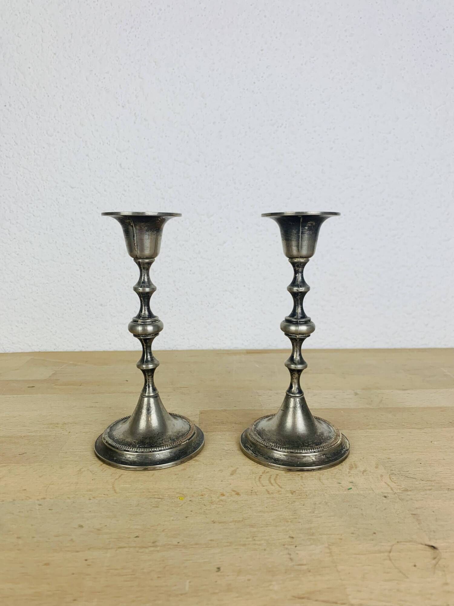 Pair of vintage silver-plated metal candlesticks