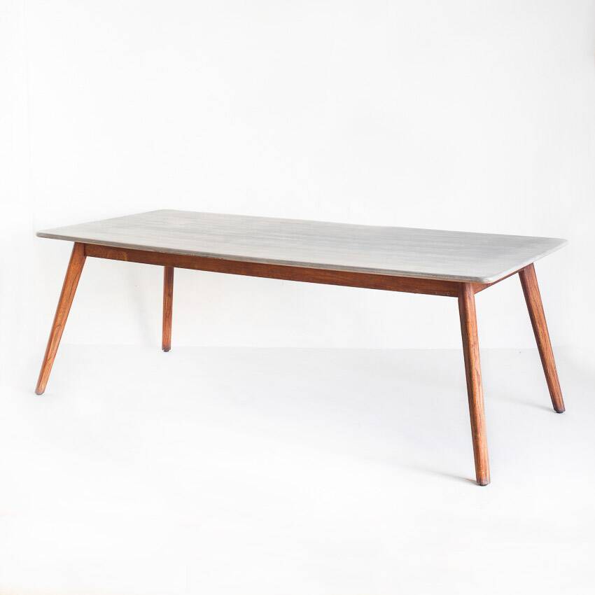 Scandinavian style dining table. Polished and varnished wood and concrete. For indoor or outdoor use.