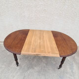 Round table with shutters with extension