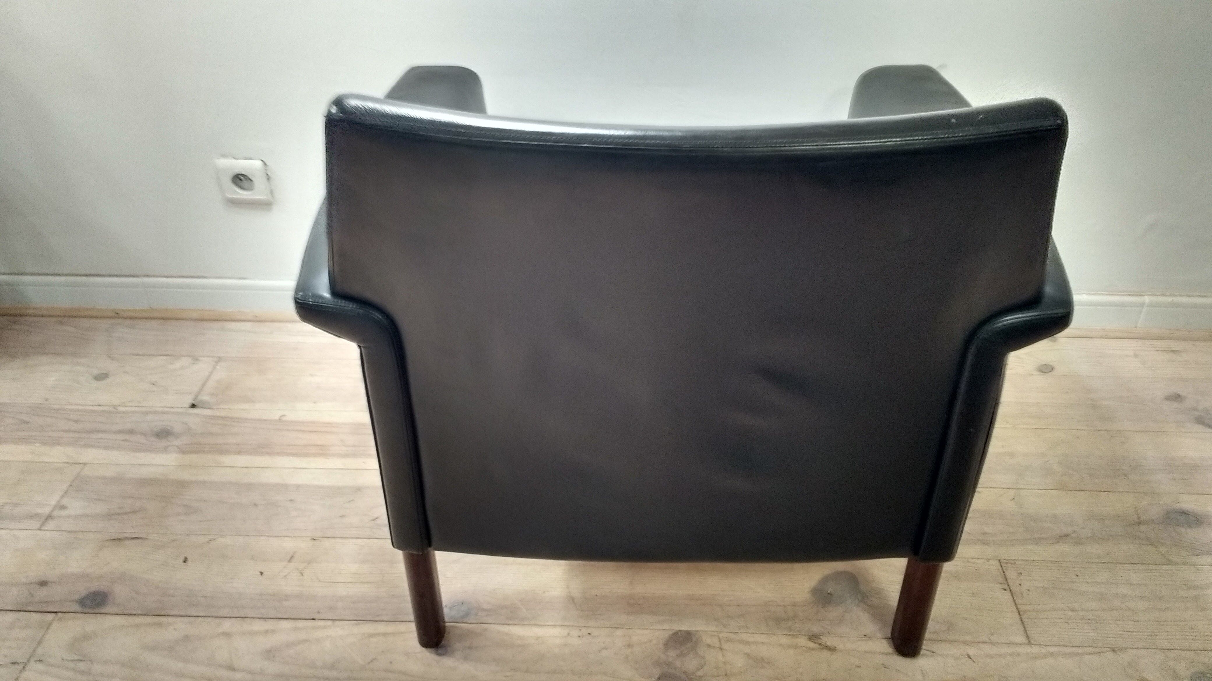 Pair of leather Danish chairs