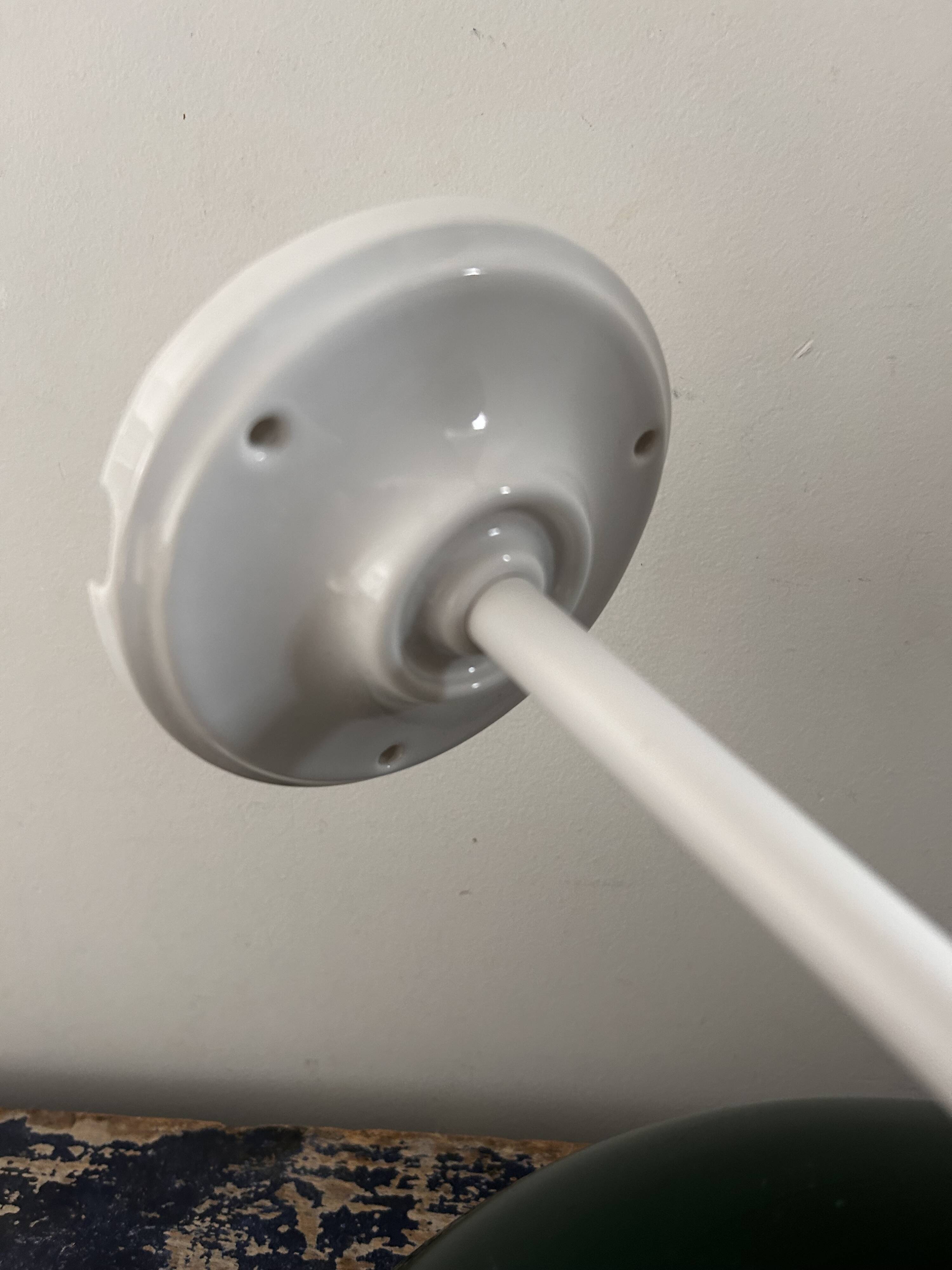 Tilting wall light in green opaline