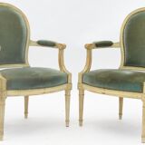 Pair of Louis XVI style convertible armchairs