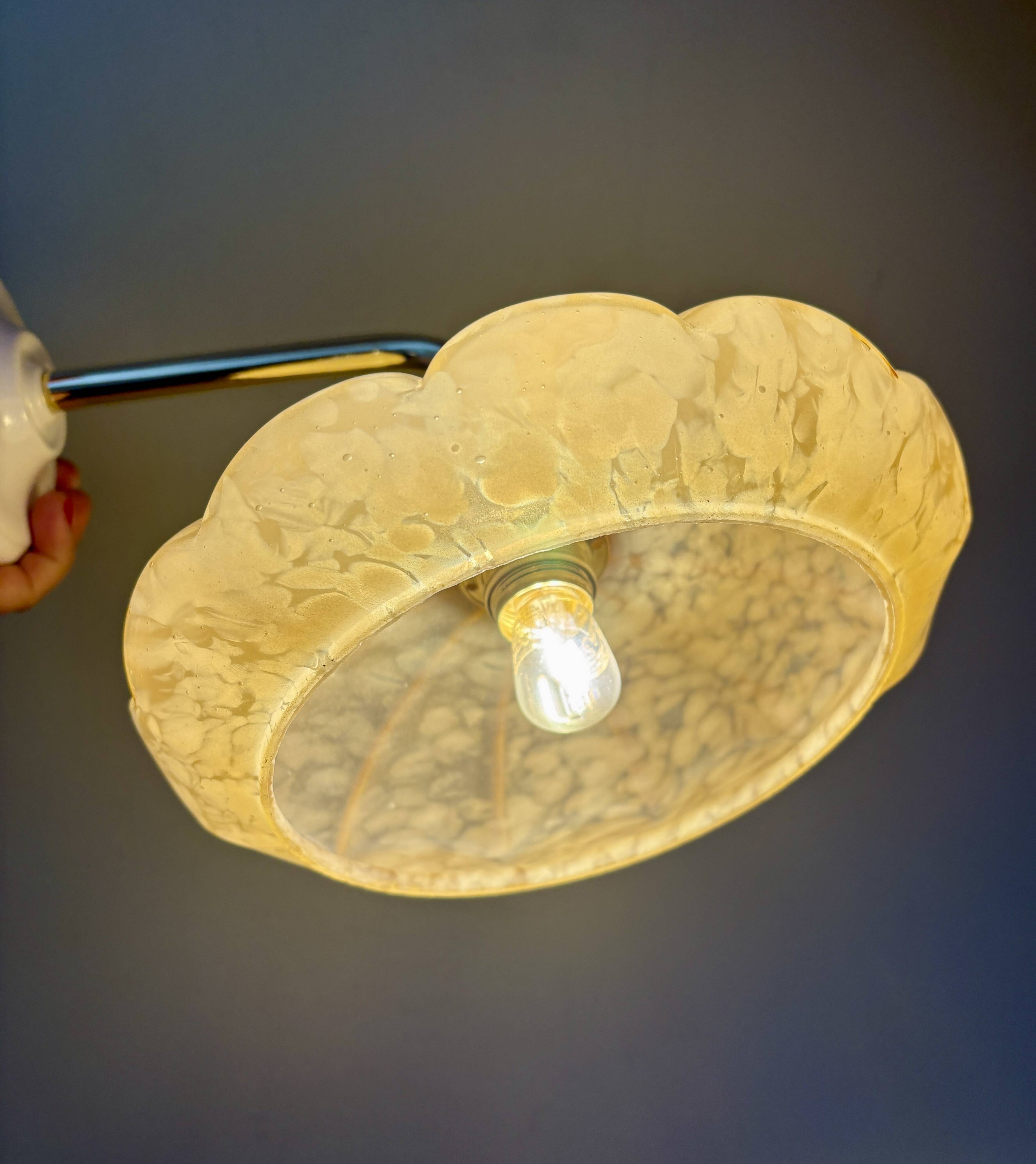 Antique wall lamp with yellow Clichy glass shade