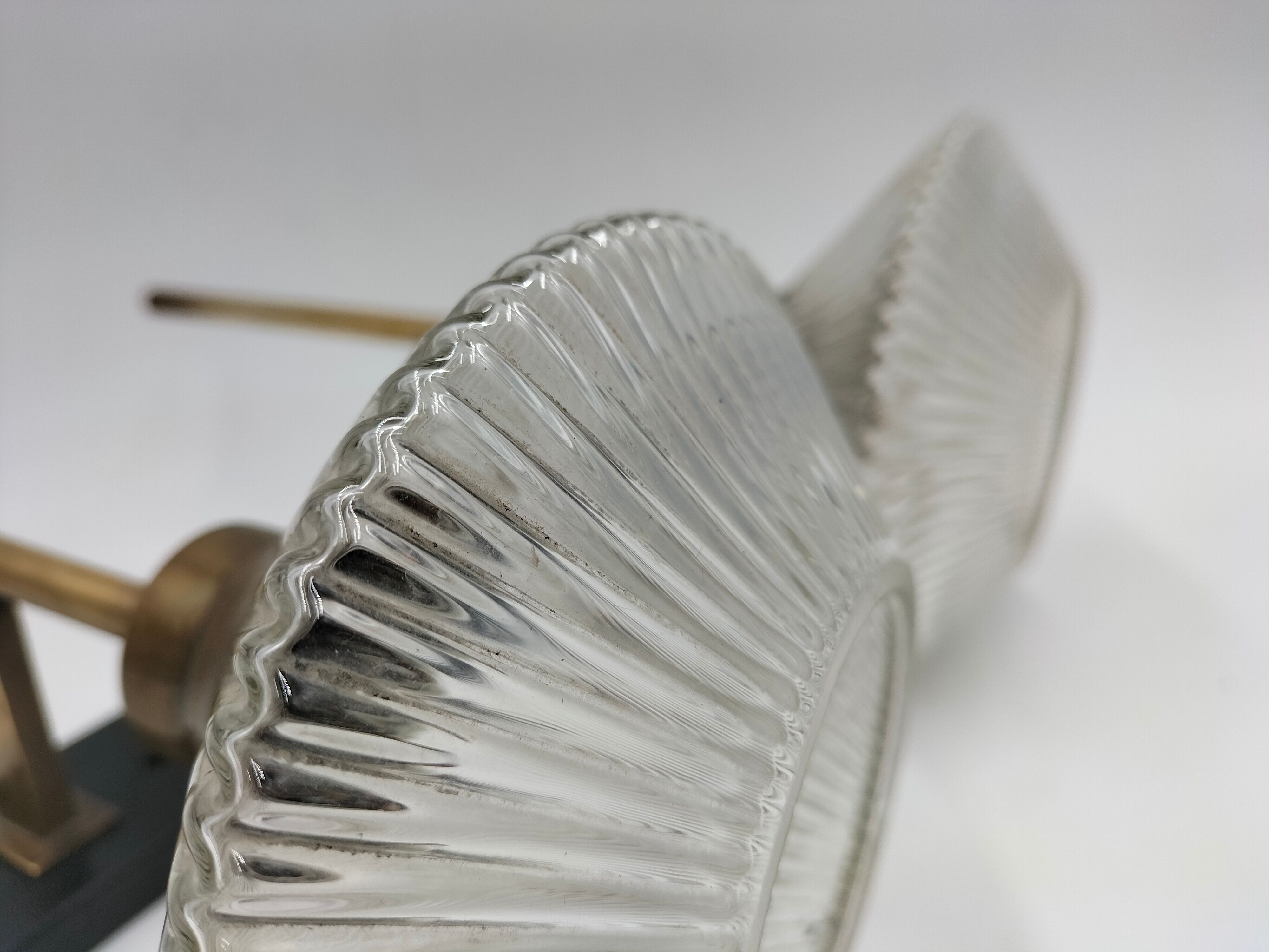 Pair of brass and glass wall lamps