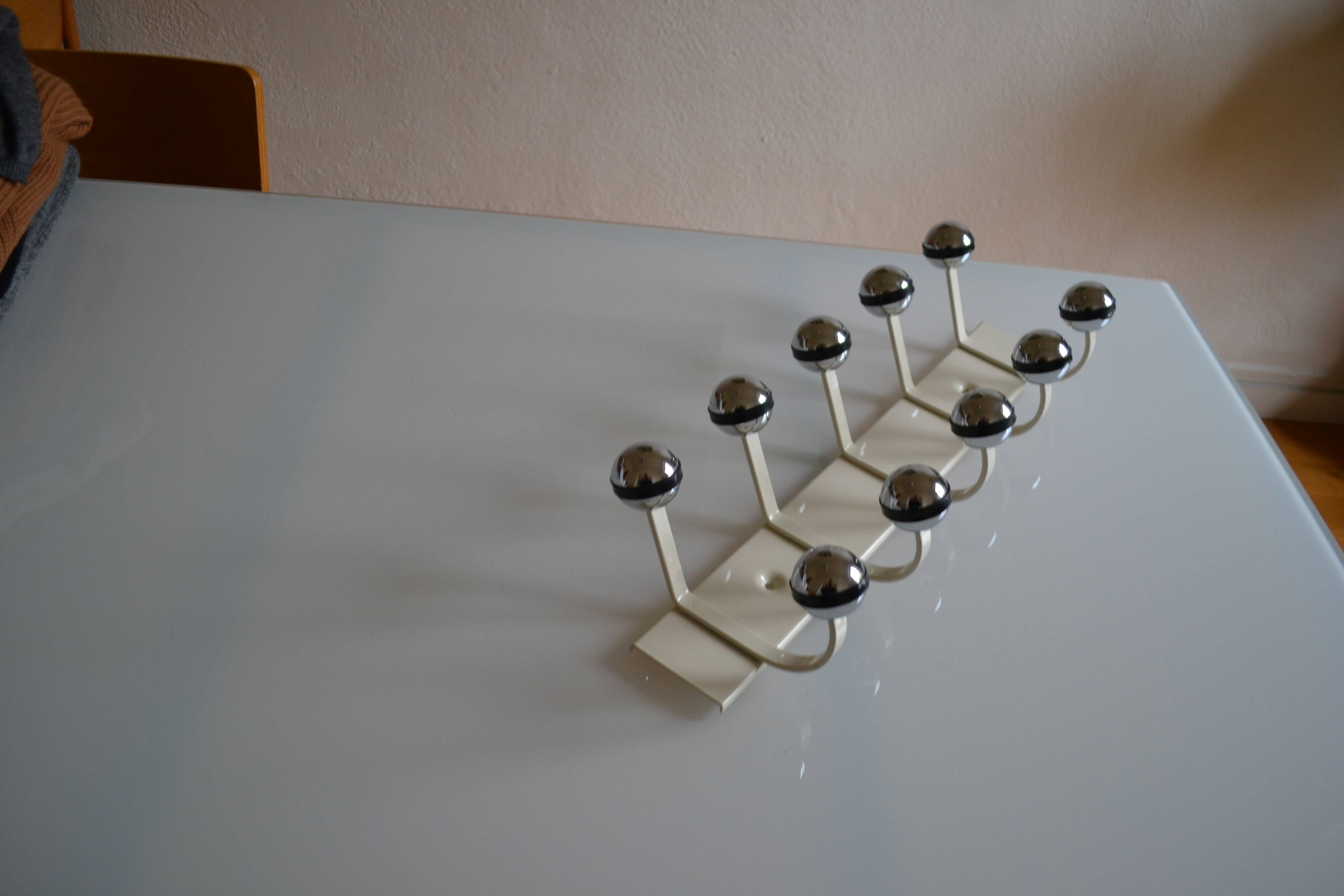Vintage 1970s wall-mounted coat rack with 10 hooks