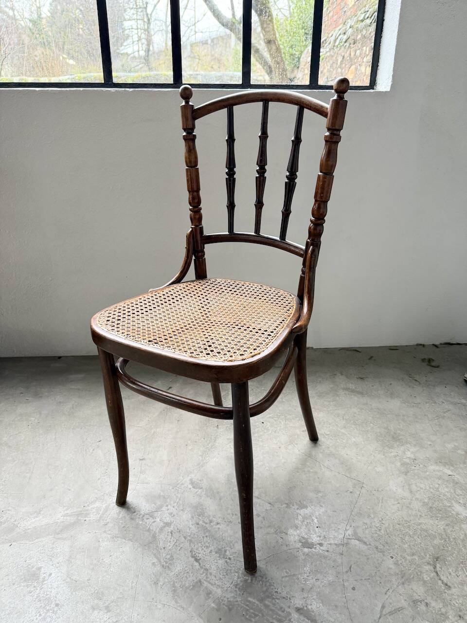 Set of 4 Fischel cane bistro chairs