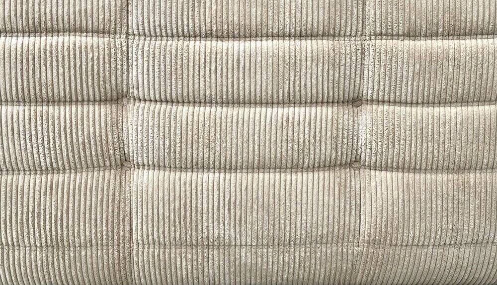 Two-seater canapé in beige corduroy attributed to Michel Ducaroy for Ligne Roset, 1970s.