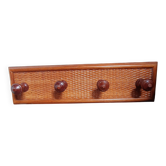 Wall-mounted coat rack with 4 hooks.