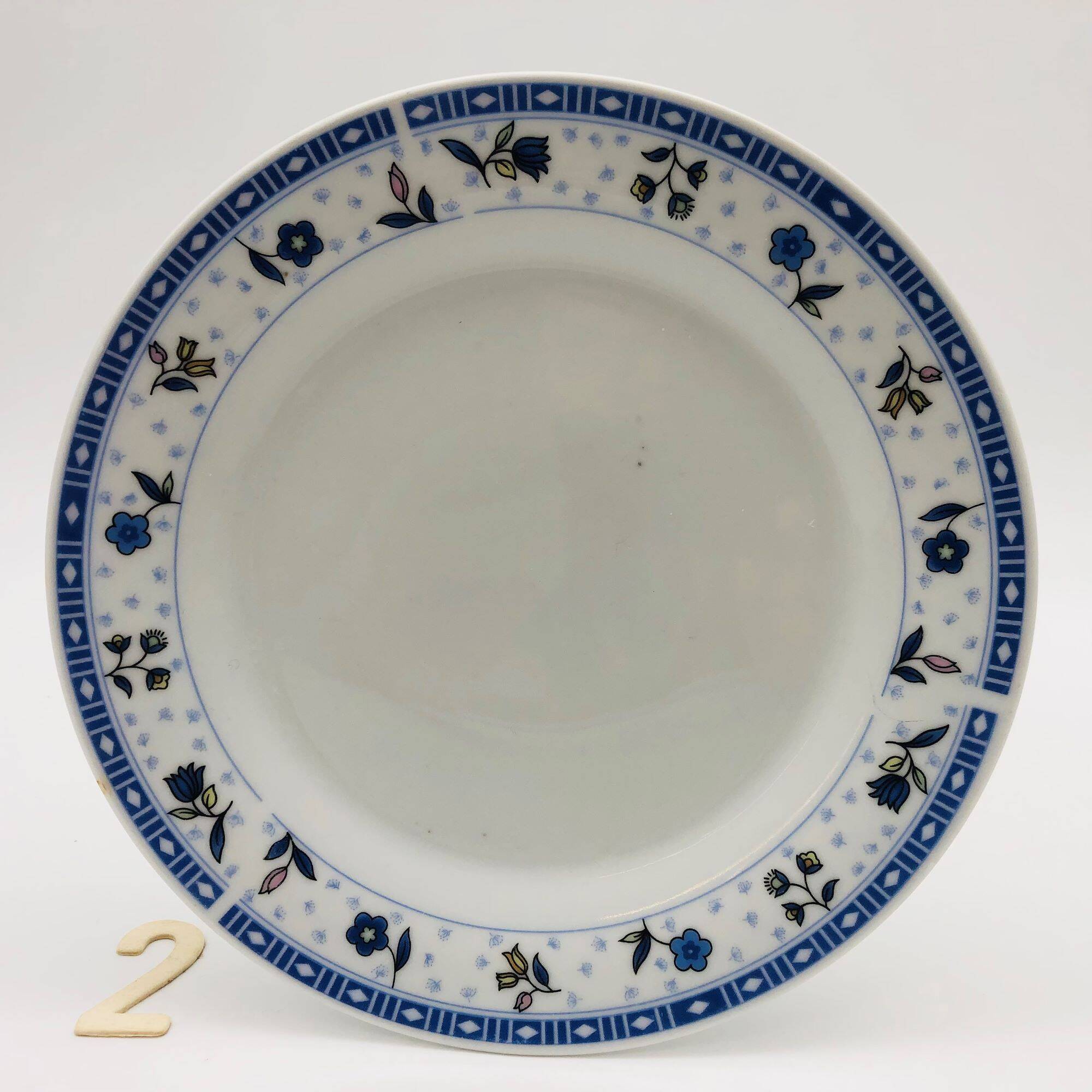 6 “Chriss G. Collection” porcelain dessert plates.