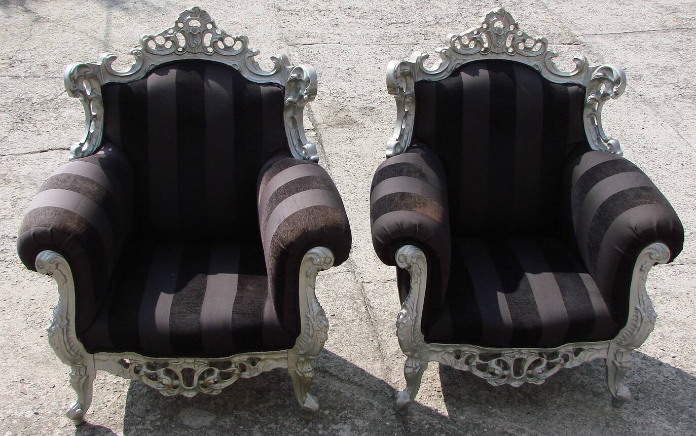 A pair of vintage armchairs, 1980s, lacquered wood and fabric