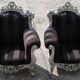 A pair of vintage armchairs, 1980s, lacquered wood and fabric