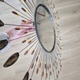 Vintage metal sun mirror in the style of Line Vautrin