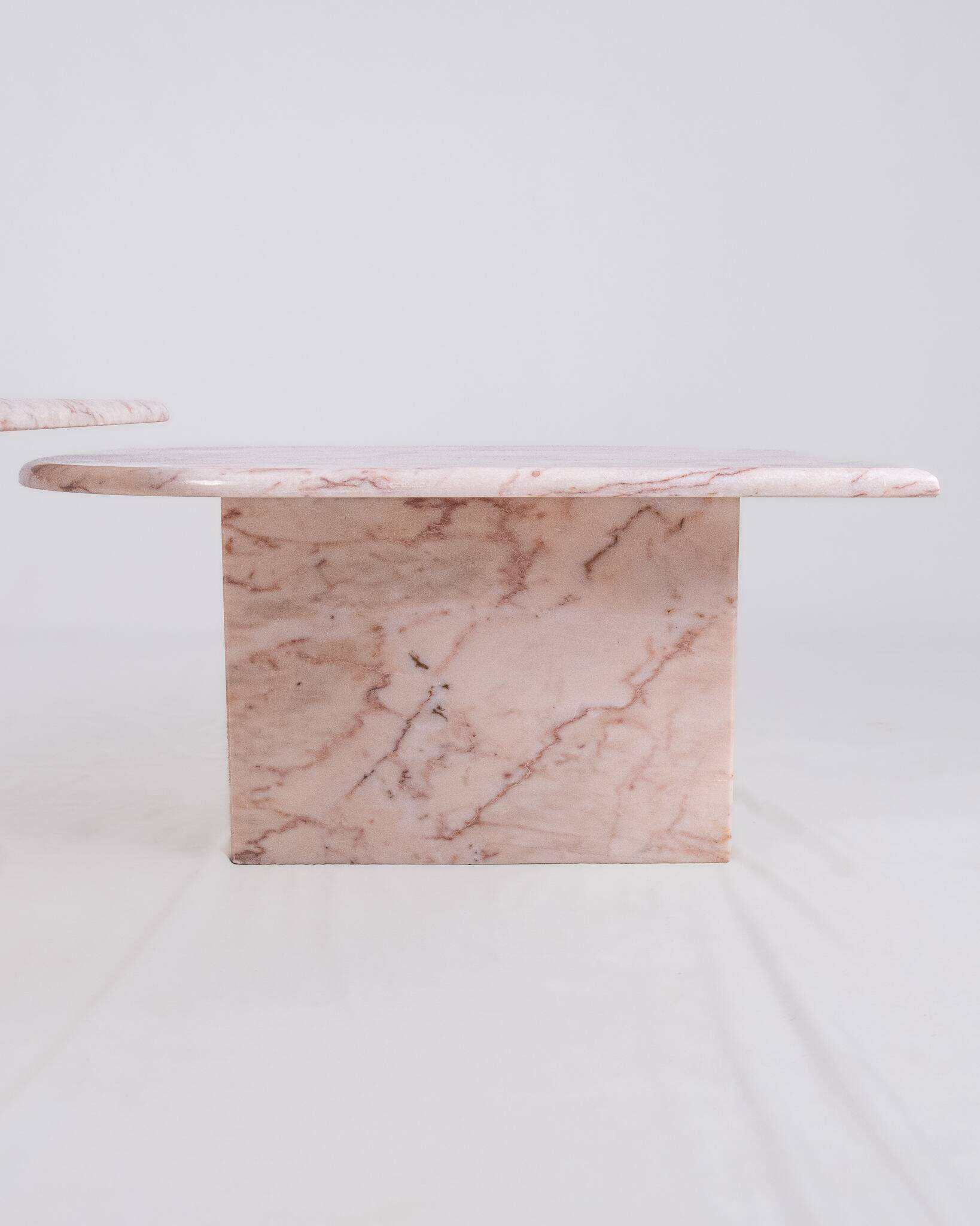 Pair of nesting coffee tables in pink marble, France, 1970s