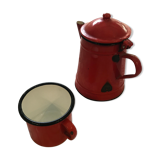 Old pitcher and cup in enamelled sheet metal