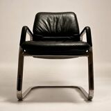 C. 1990 - Office chair in black leather and chrome-plated steel - Italy