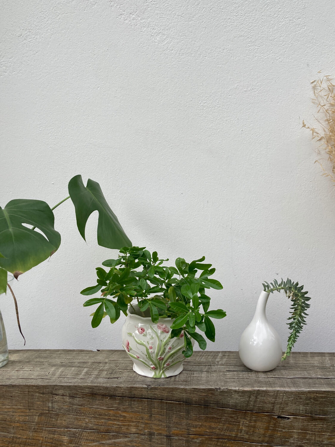 White ceramic pot cache in old flower slip