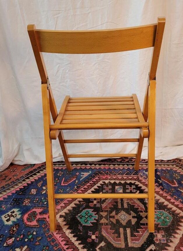 Set of 4 folding chairs in varnished wood