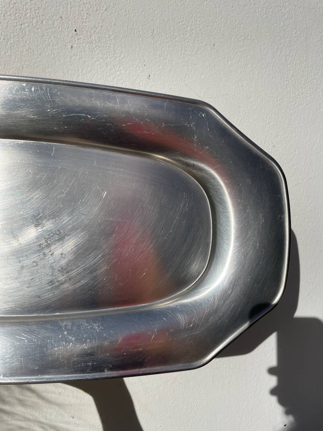 Large, long oval stainless steel platter by Rémy Letang