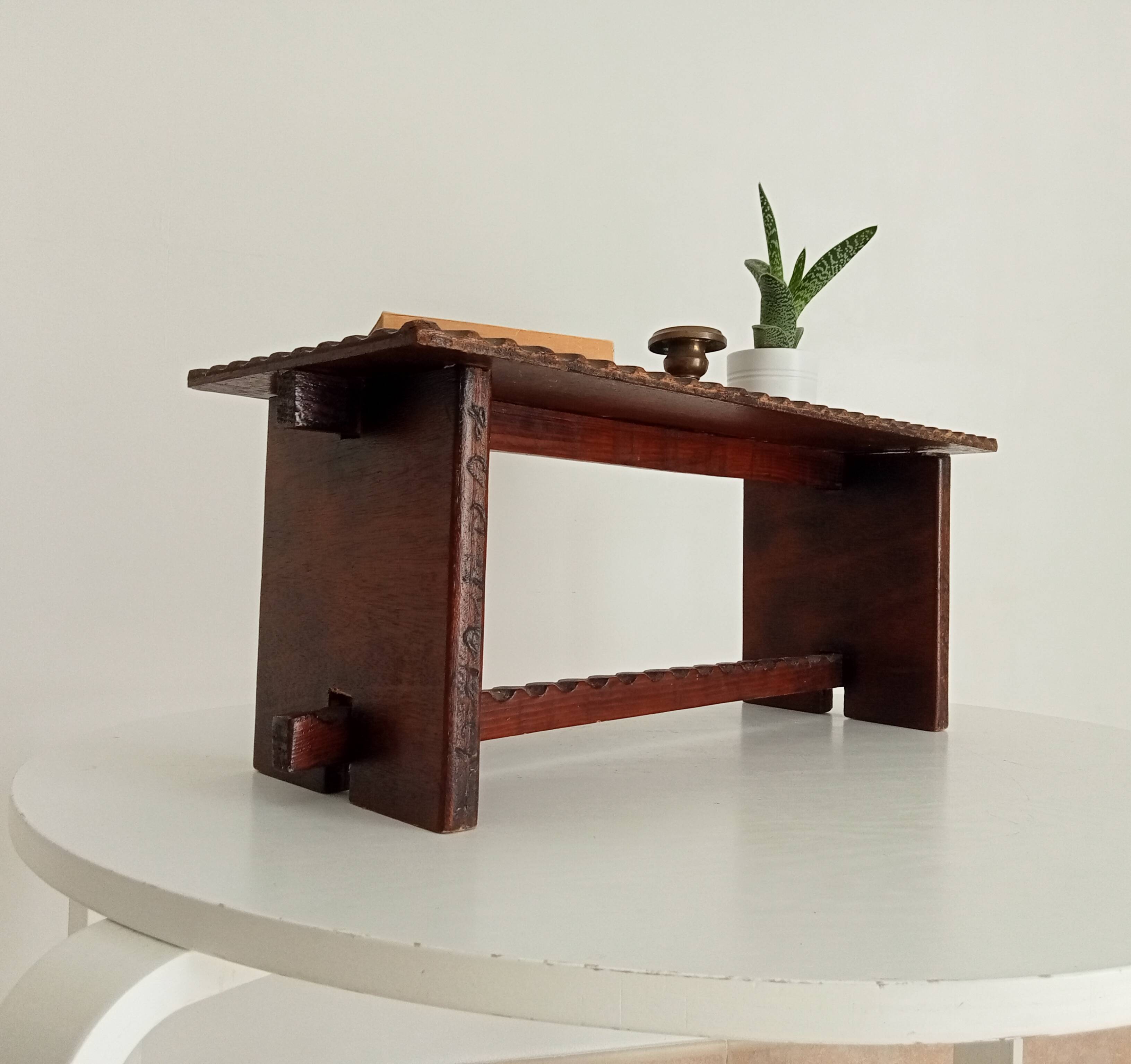 Low brutalist stool in the style of Charles Dudouyt.