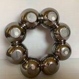 Silver flower vase in a crown shape.