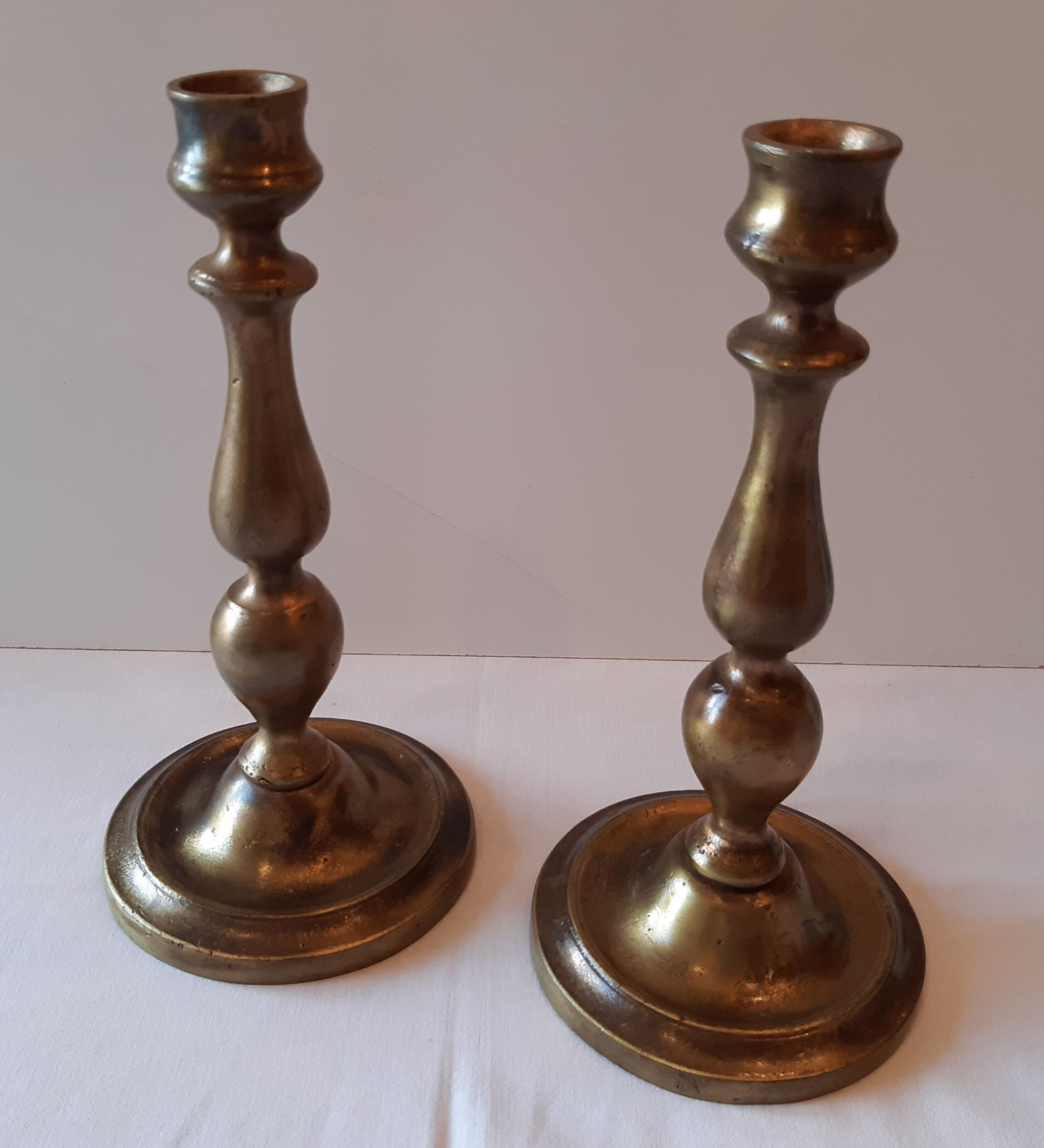 Lot of 2 old bronze candlesticks