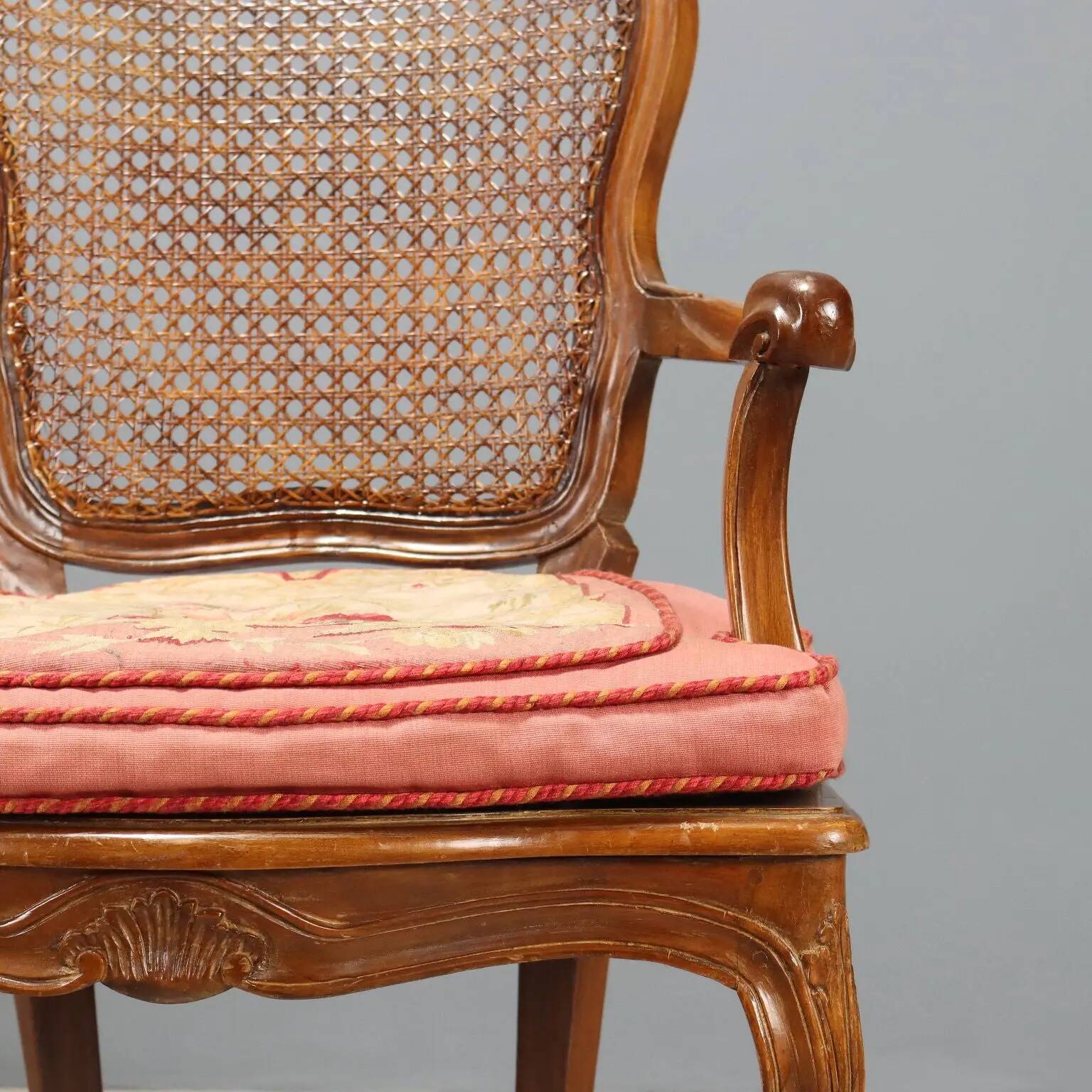 Antique baroque-style armchairs in walnut and fabric, 19th century.