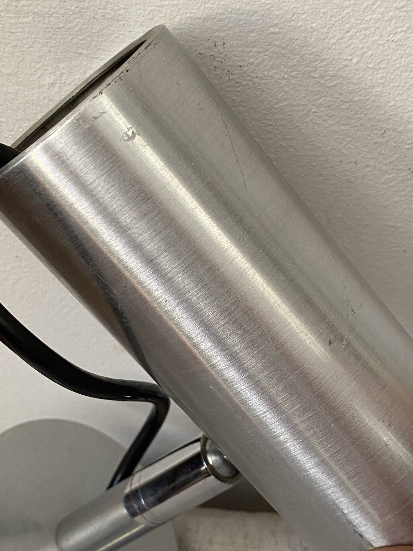 Pair of brushed metal wall sconces