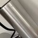 Pair of brushed metal wall sconces