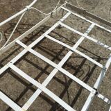 Ancient white metal bed