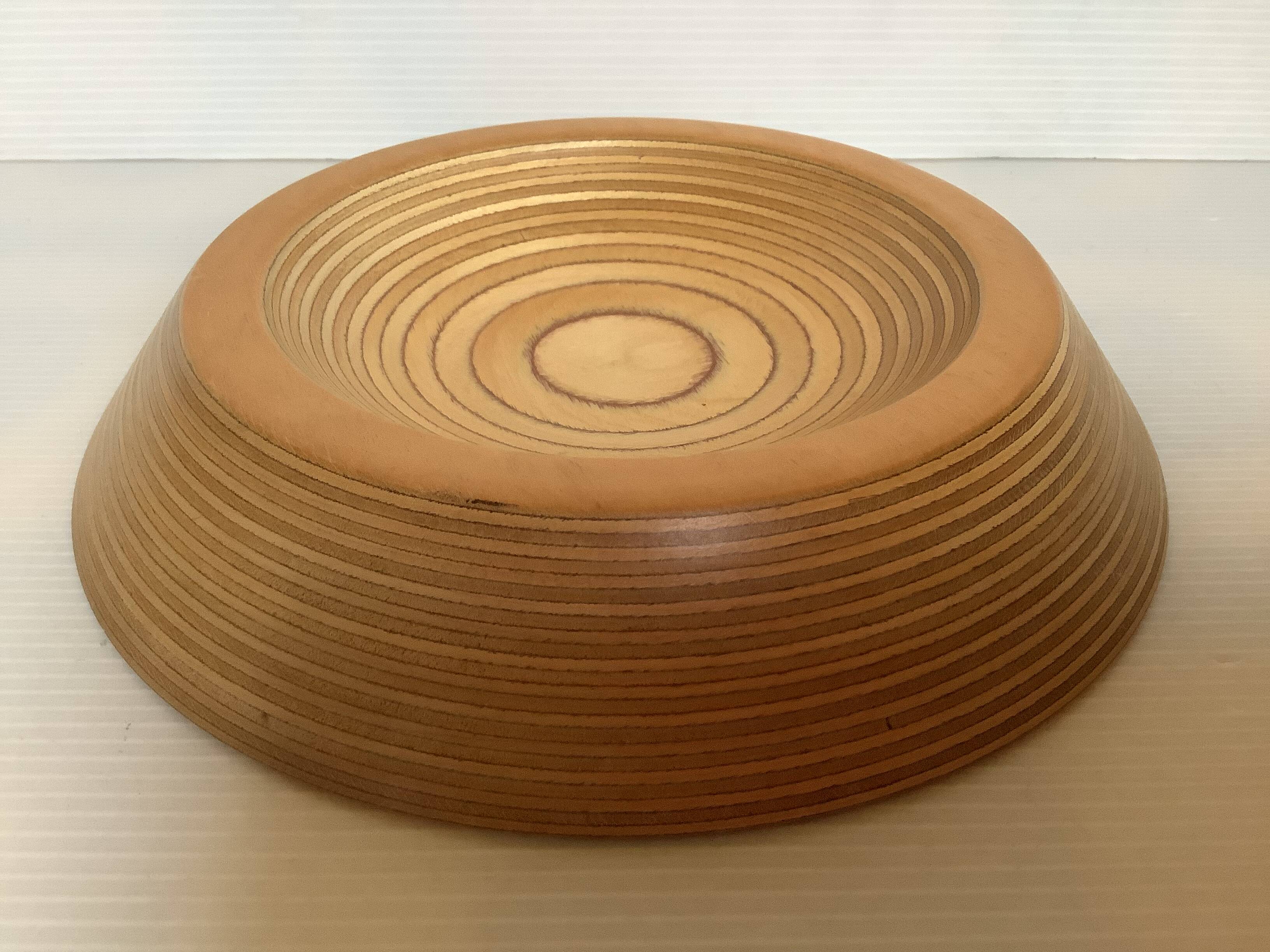 Glued laminated wood pocket emptier