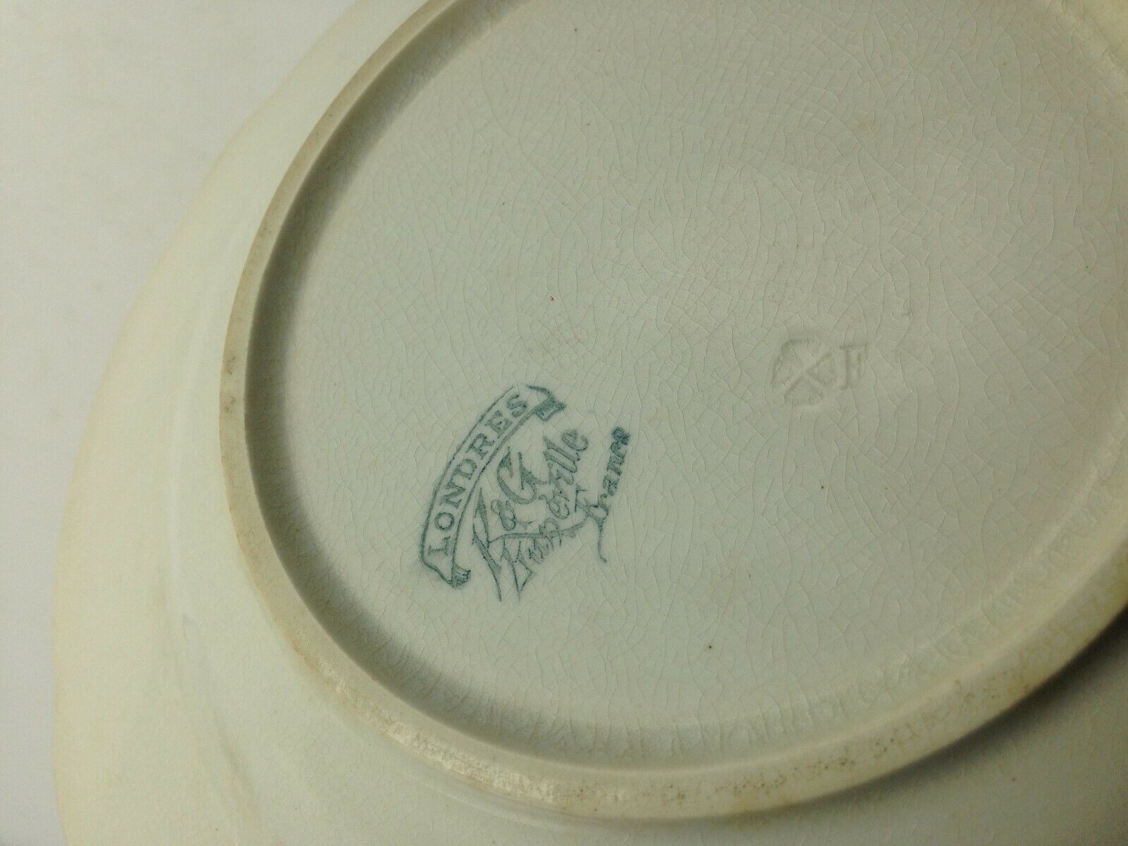 Pair of old hollow plates in Moonville model London earthenware