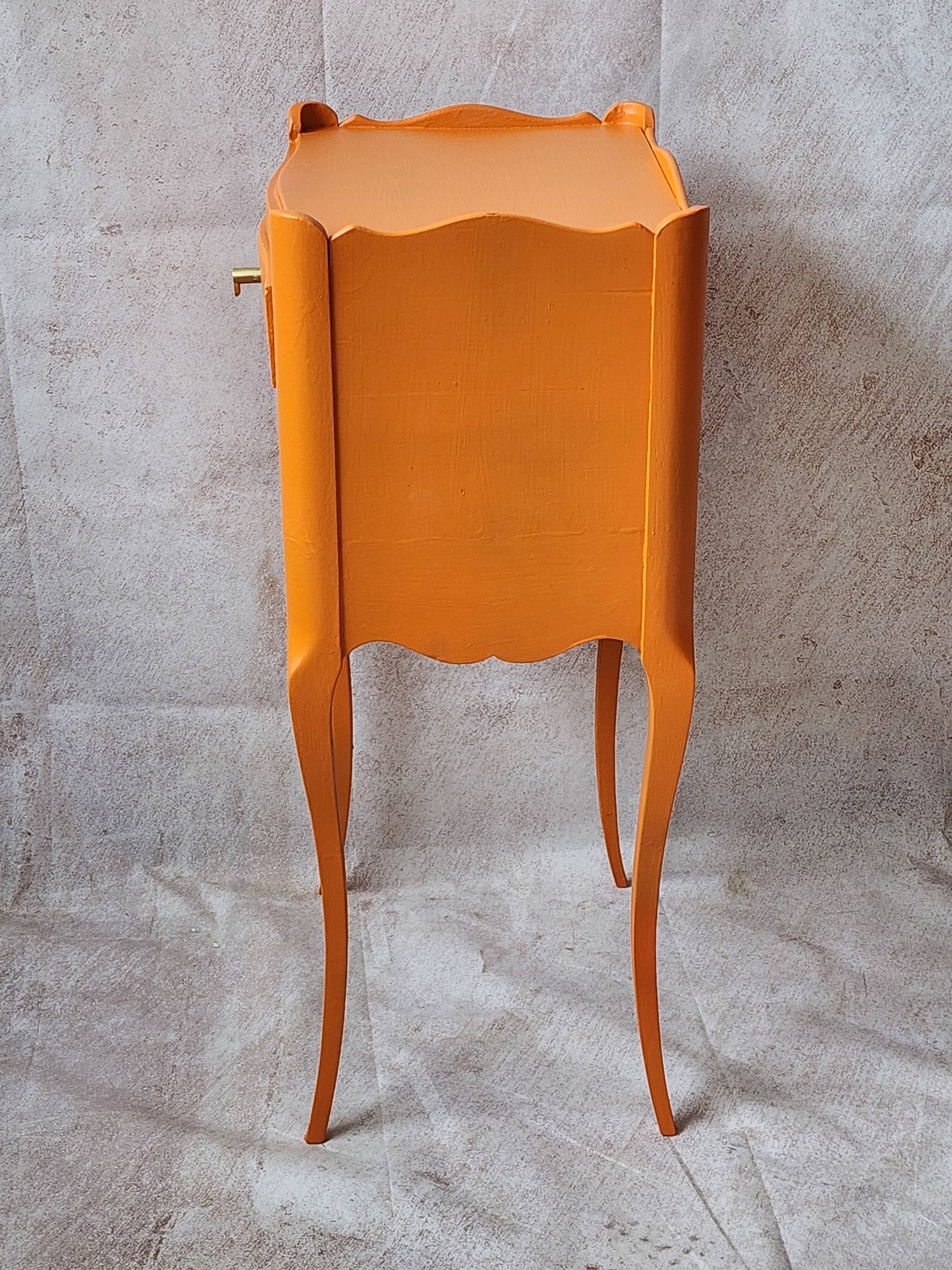 Old orange bedside table