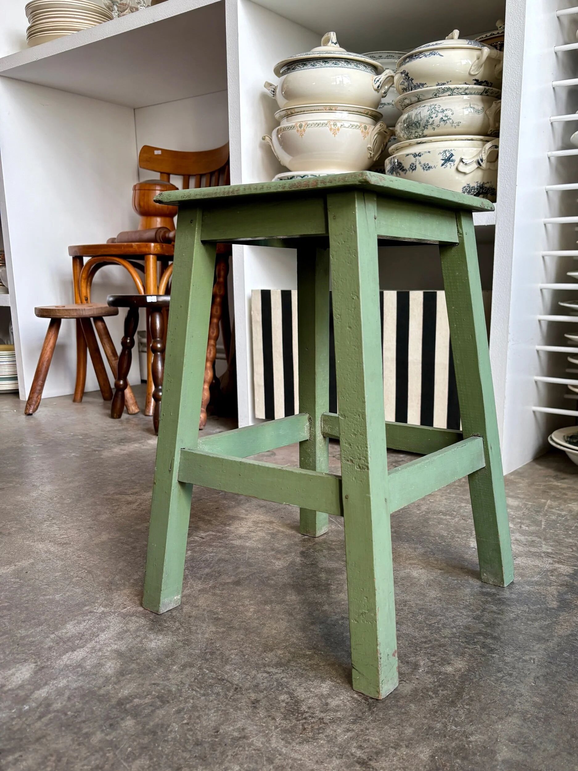 Green wooden stool