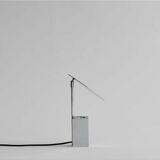 Reflect table lamp in chrome metal, contemporary work.