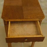Small art deco style piece of furniture with one drawer and one shelf