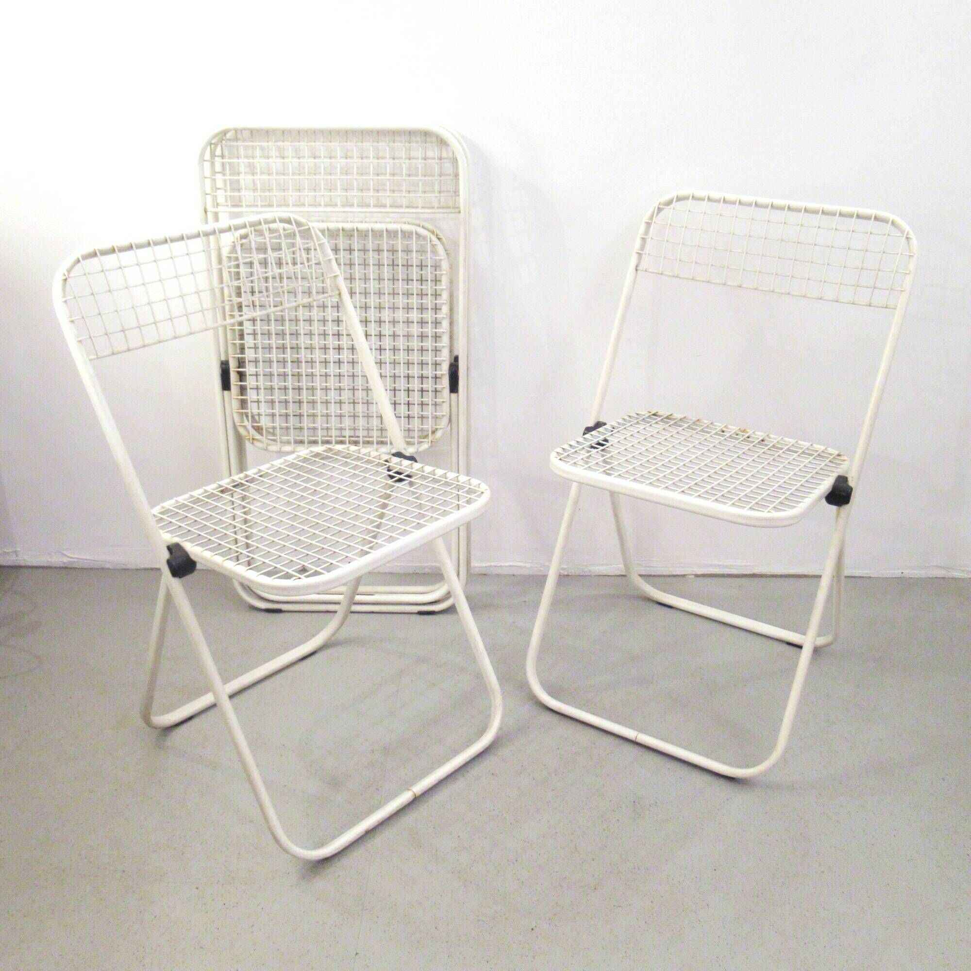 Four Talin Spa metal mesh chairs from the 1980s.