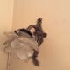 Old wall lamp in bronze and glass