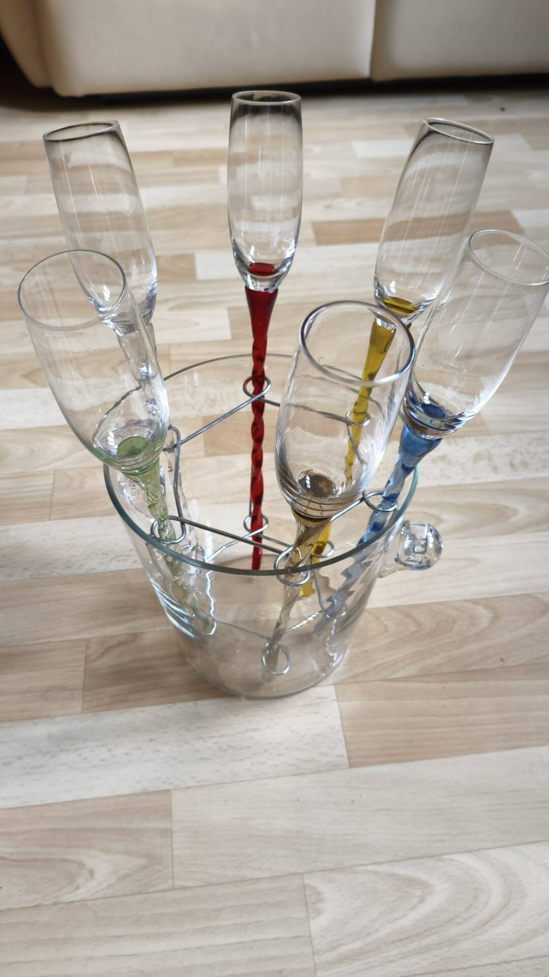 Crystal champagne flutes in their bucket