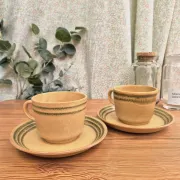 Two vintage Sarreguemines stoneware breakfast cups.