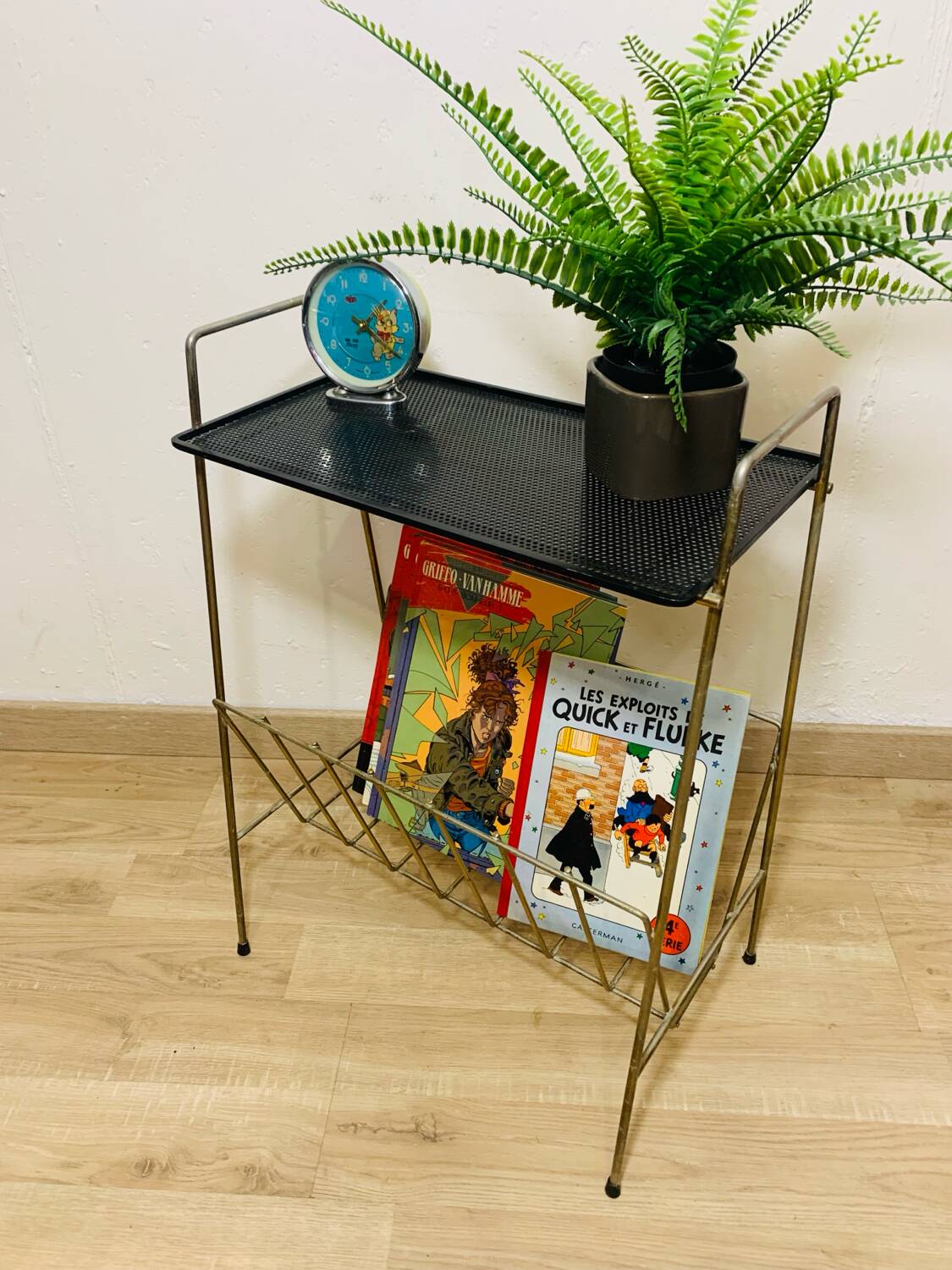 Perforated metal magazine rack