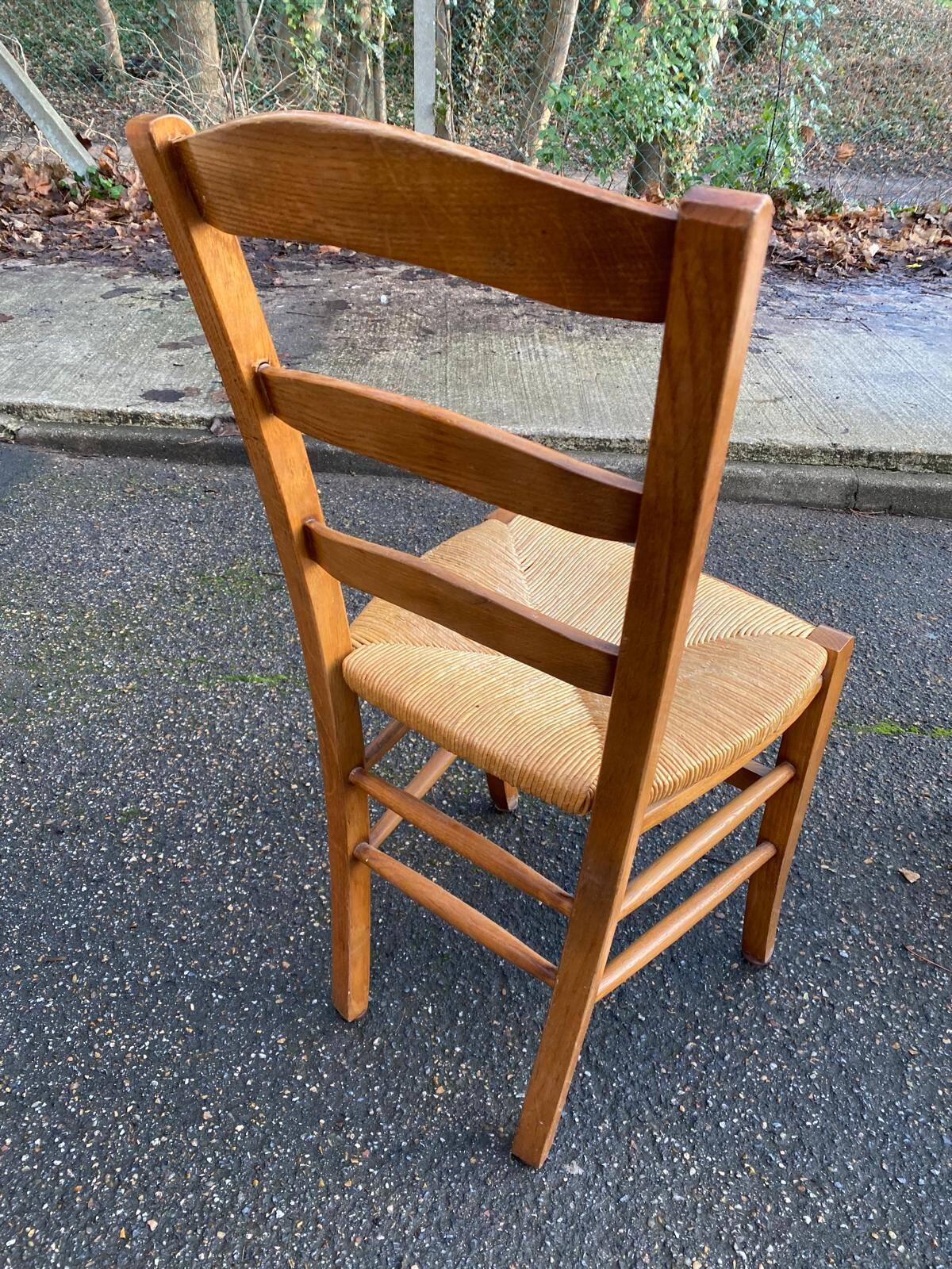 4 solid wood straw-seated Louis Philippe chairs, oak, 20th century.