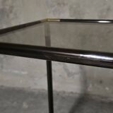 Black metal and brass rolling dessert trolley, smoked glass, 1970s.