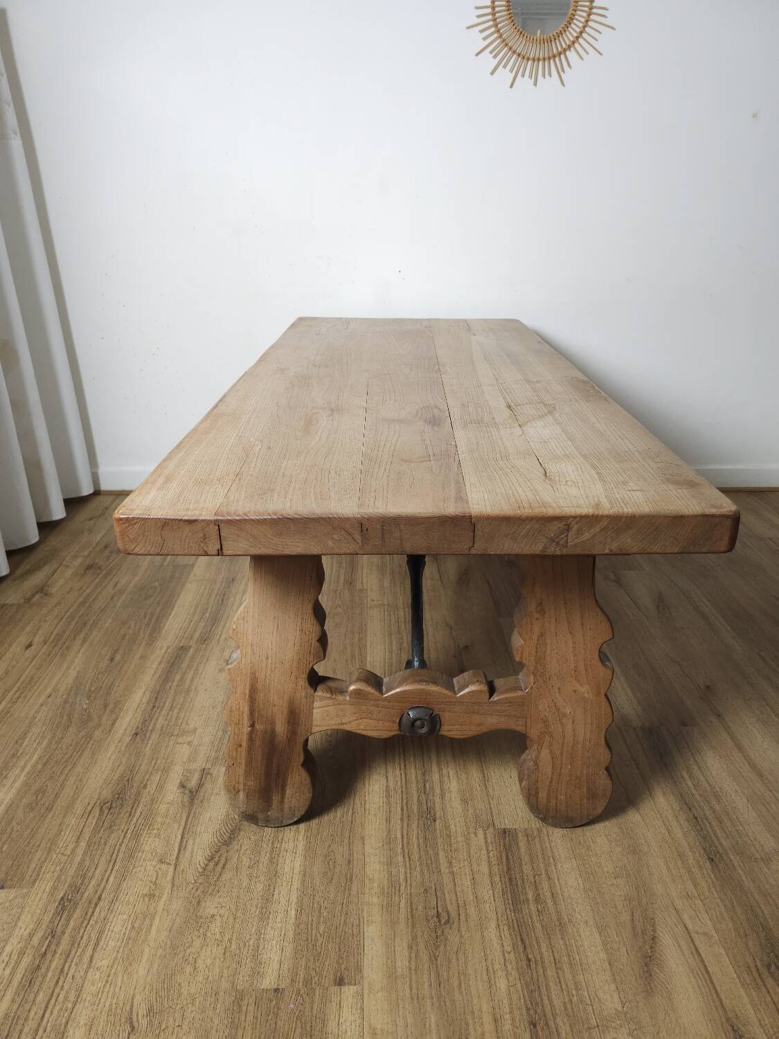 Rustic solid oak table with wrought iron, circa 1950.