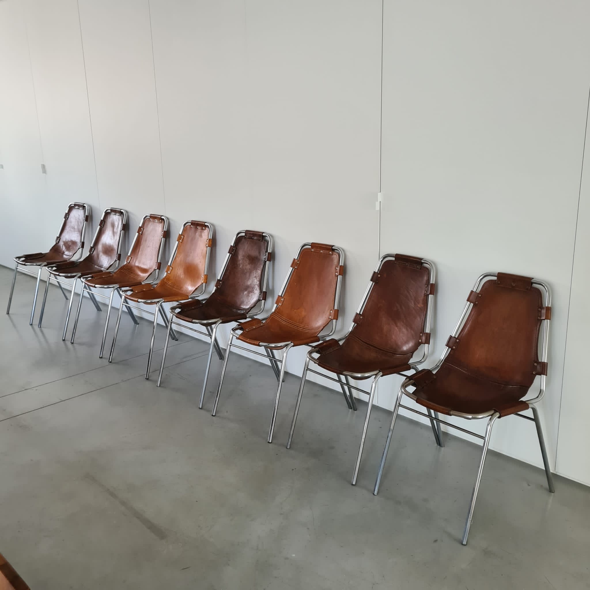Set of eight mid-century leather dining chairs