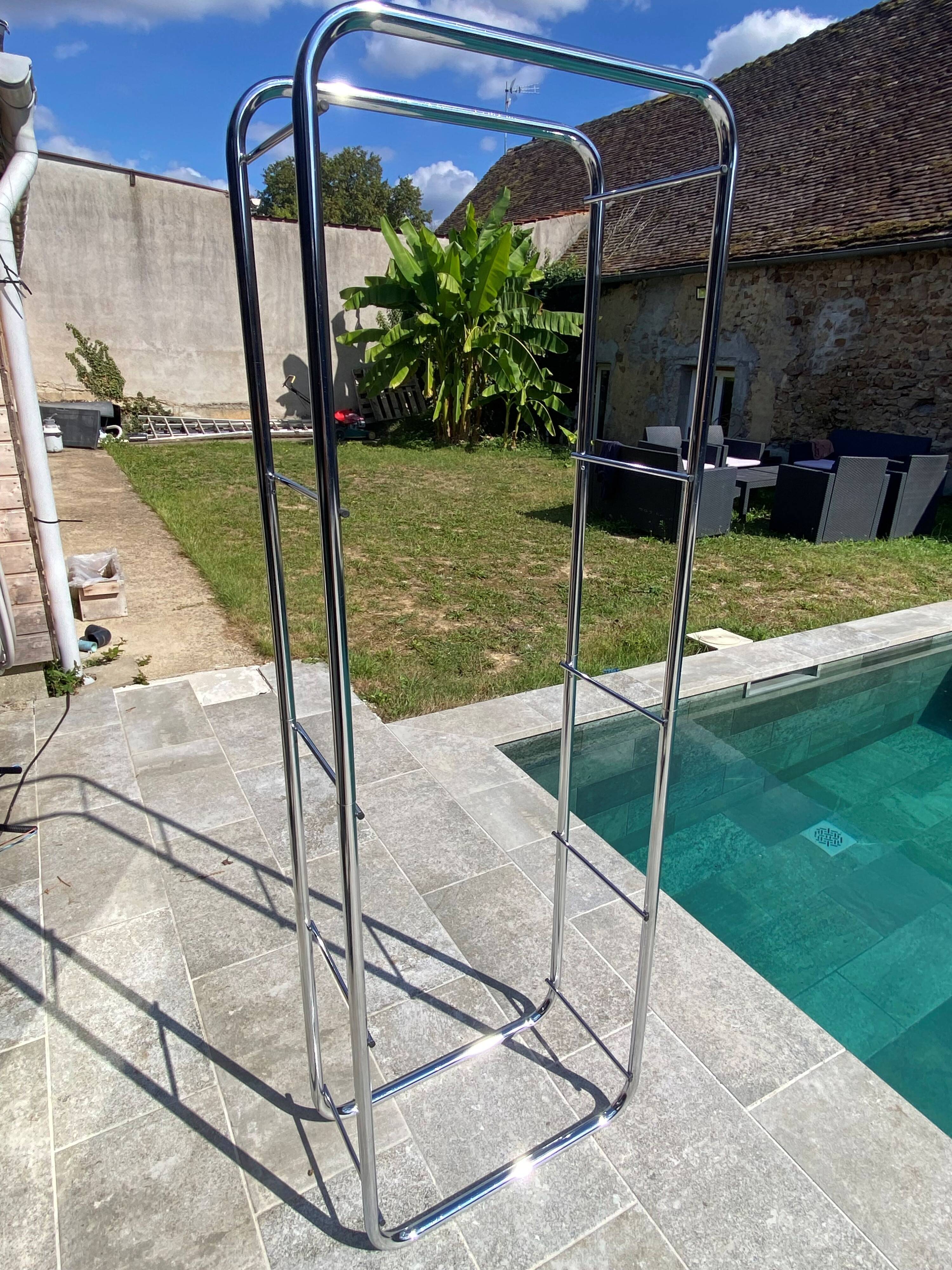 Bauhaus style bookcase with modular wall shelf, glass and chrome