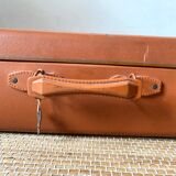 Antique suitcase and its key