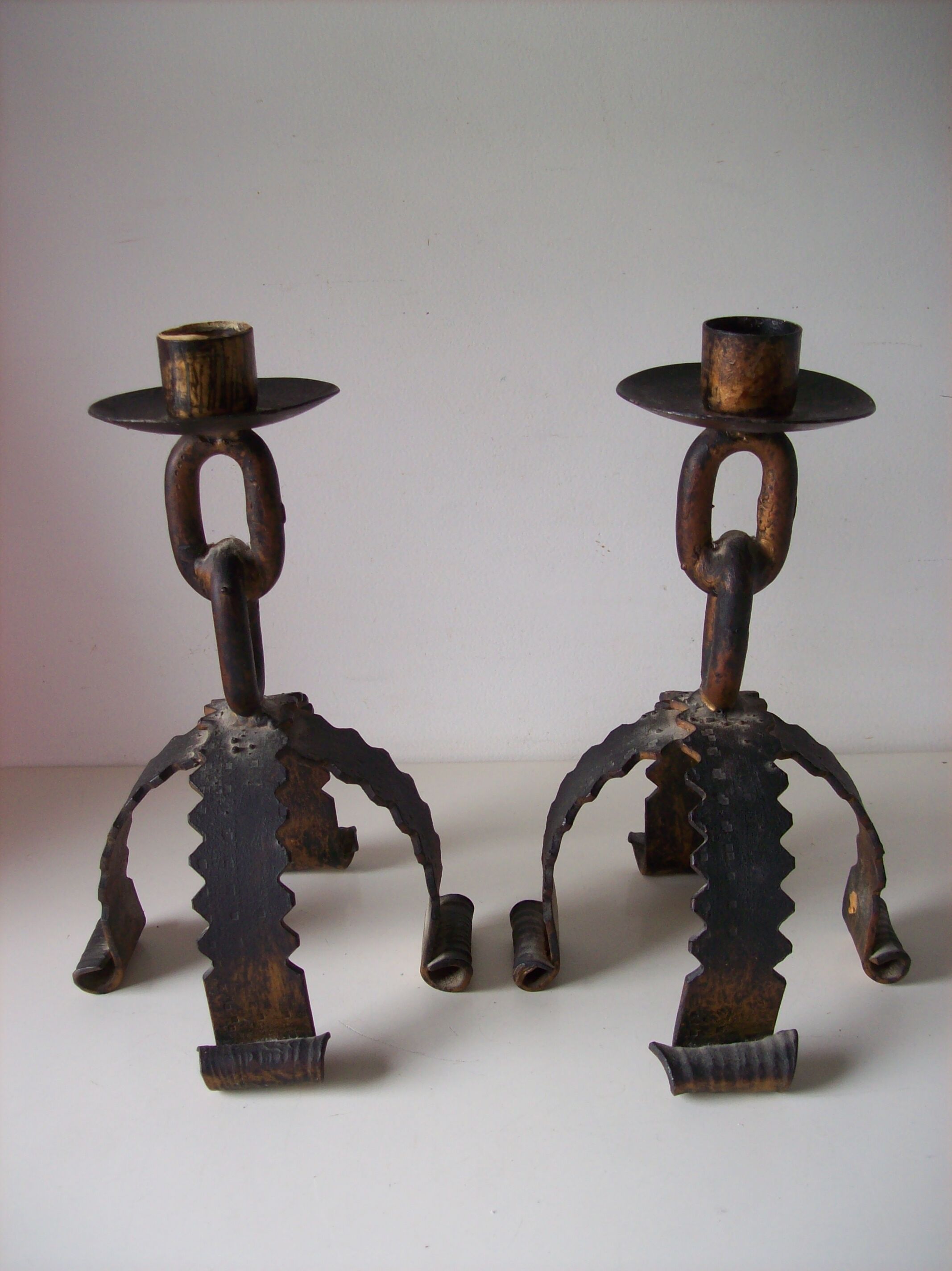 Pair of metal candlesticks